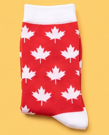 Red moJJa crew socks with white maple leaves and white cuffs