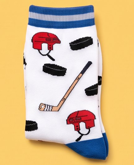 White moJJa crew socks with hockey helmets, sticks and pucks and blue cuffs